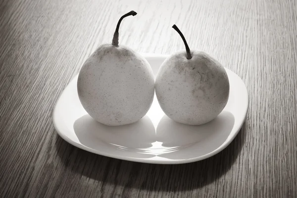 Two pears sepia — Stock Photo, Image