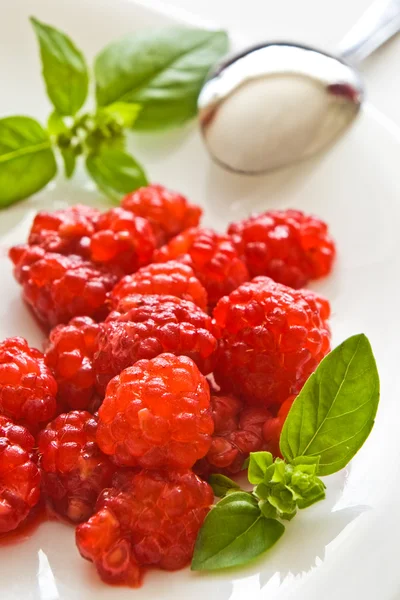 Raspberries on plate — Stock Photo, Image