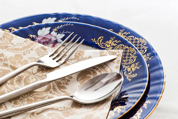 stock image Silverware on fine porcelain