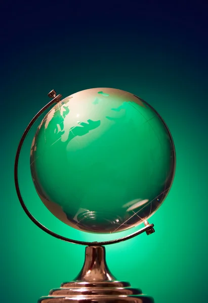 Globe on green — Stock Photo, Image