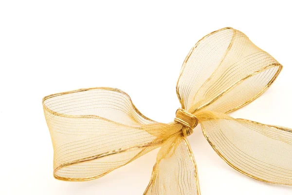 Gift golden ribbon and bow — Stock Photo, Image