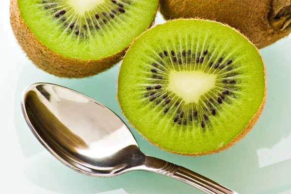 Kiwi and spoon — Stock Photo, Image