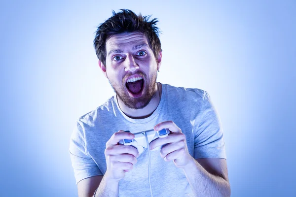 Hombre sorprendido con Gamepad — Foto de Stock