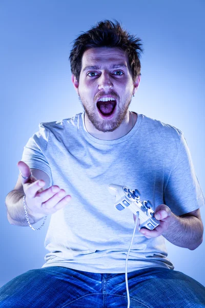 Homem chocado com Gamepad — Fotografia de Stock