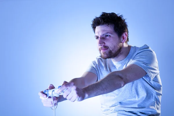 Concentrated Man with Gamepad — Stock Photo, Image
