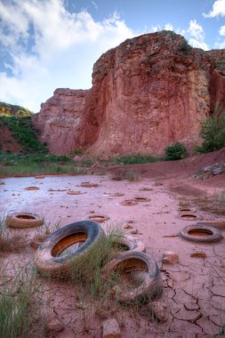 Tires in a Bauxite Pit clipart