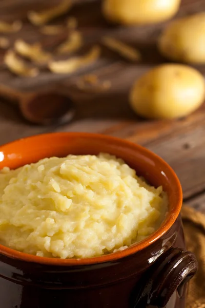 stock image Mashed Potatoes in Terracotta Pot on Wood