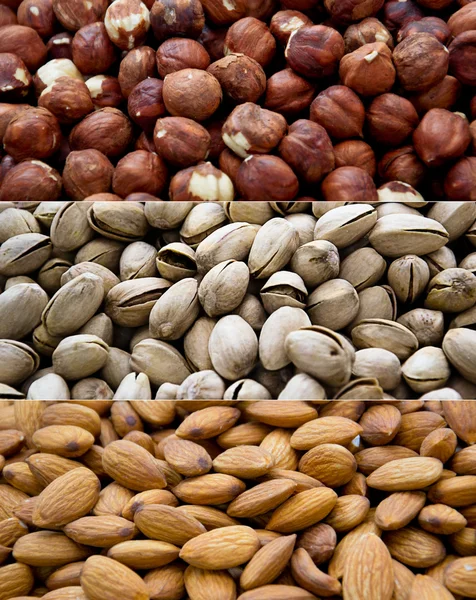 Close-up van verschillende noten (amandelen, cashewnoten en filbers) — Stockfoto