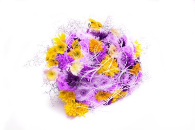 Flower arrangement of pink, yellow and white chrysanthemums clipart