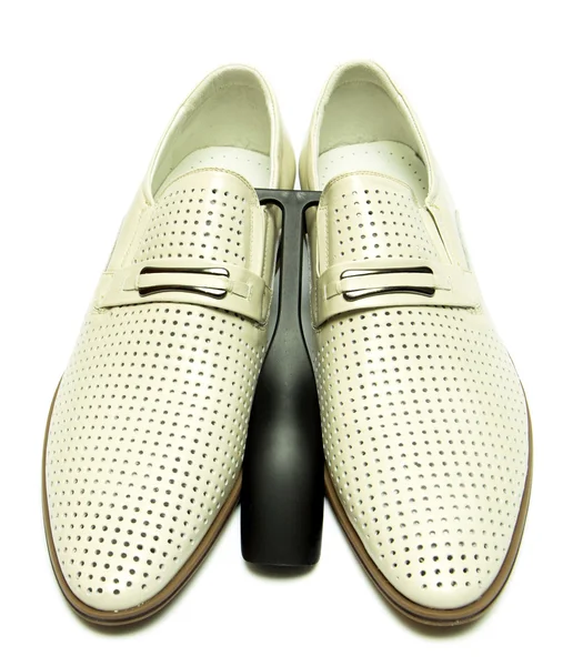 Mannens skor på vit bakgrund — Stockfoto