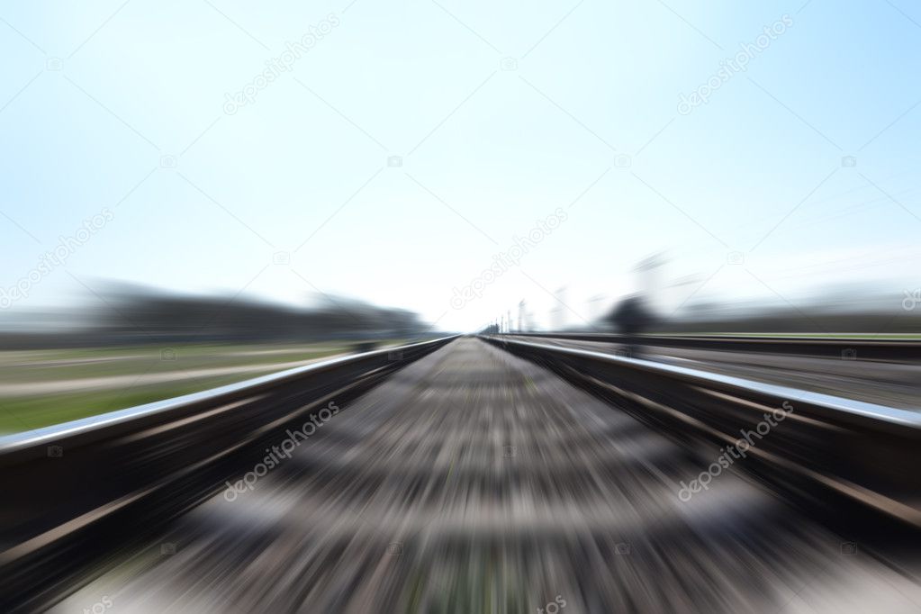 Photo of a Fast train in motion and blue sky