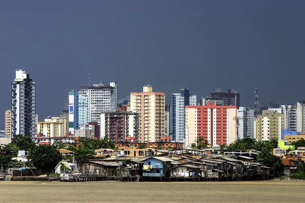 stock image Modern buildings and palafitte slum