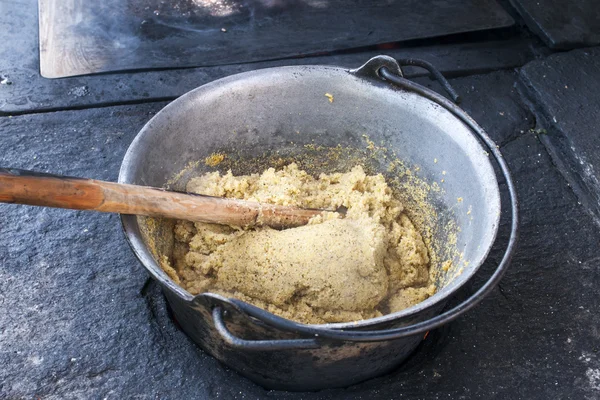 stock image Cooking polenta on wood stove