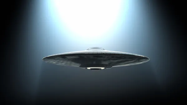 Flying saucer in light — Stock Photo, Image