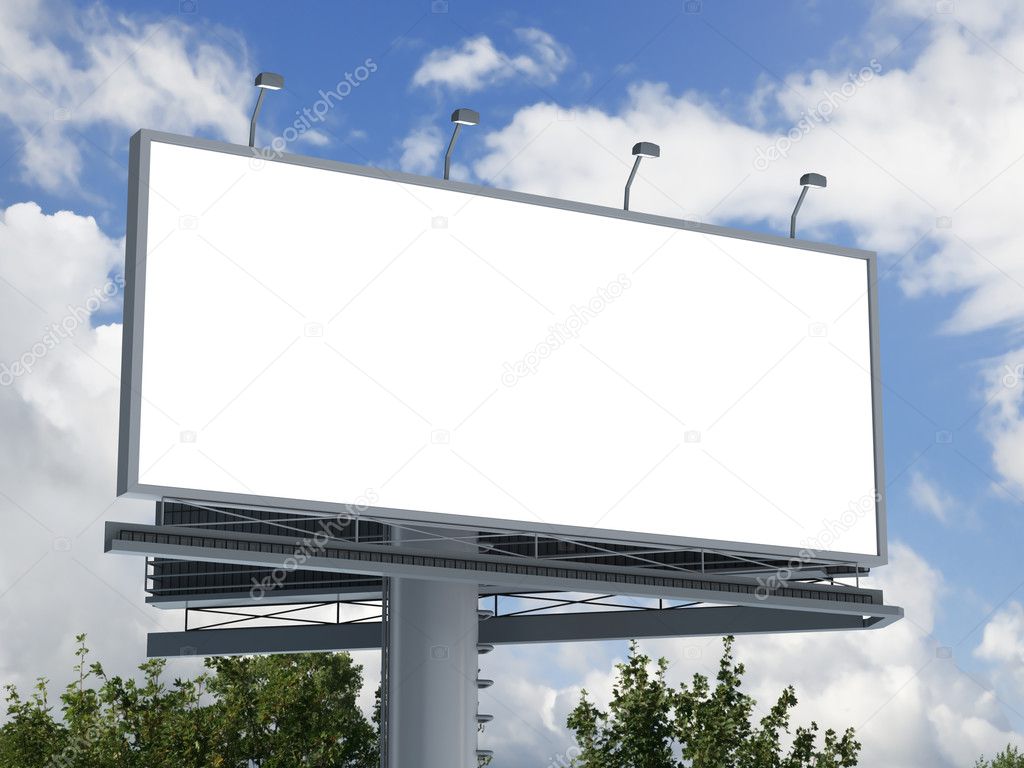 Billboard against blue cloudy sky
