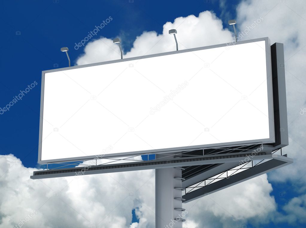 Billboard against blue cloudy sky
