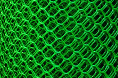 Roll of a green plastic net for a fence clipart
