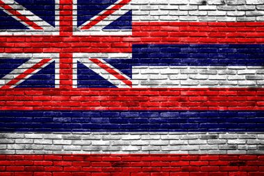 Hawaii vlag geschilderd op oude bakstenen muur