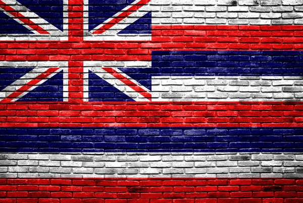 Hawaje bandery malowane na stary ceglany mur — Zdjęcie stockowe