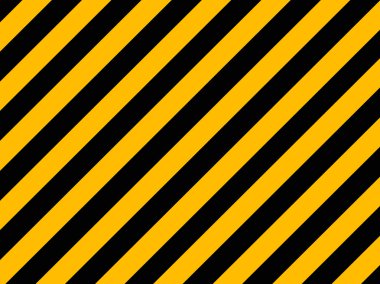 Yellow and black diagonal hazard stripes painted on old brick wa clipart