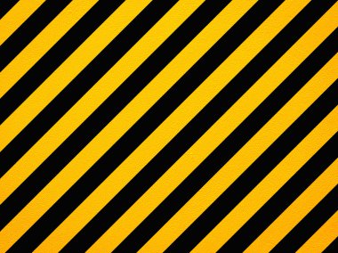 Yellow and black diagonal hazard stripes painted on old brick wa clipart