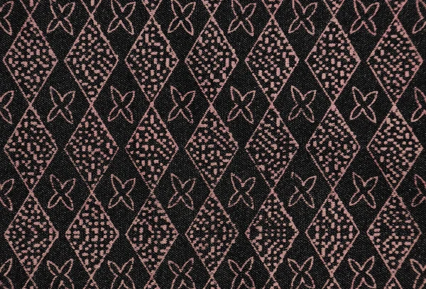 黒い布にヴィンテージのパターン — ストック写真