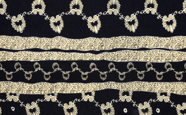 White flower pattern on black fabric — Stock Photo, Image