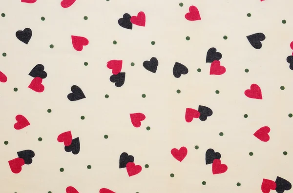 Black and red heart shaped on fabric — Stock Photo, Image