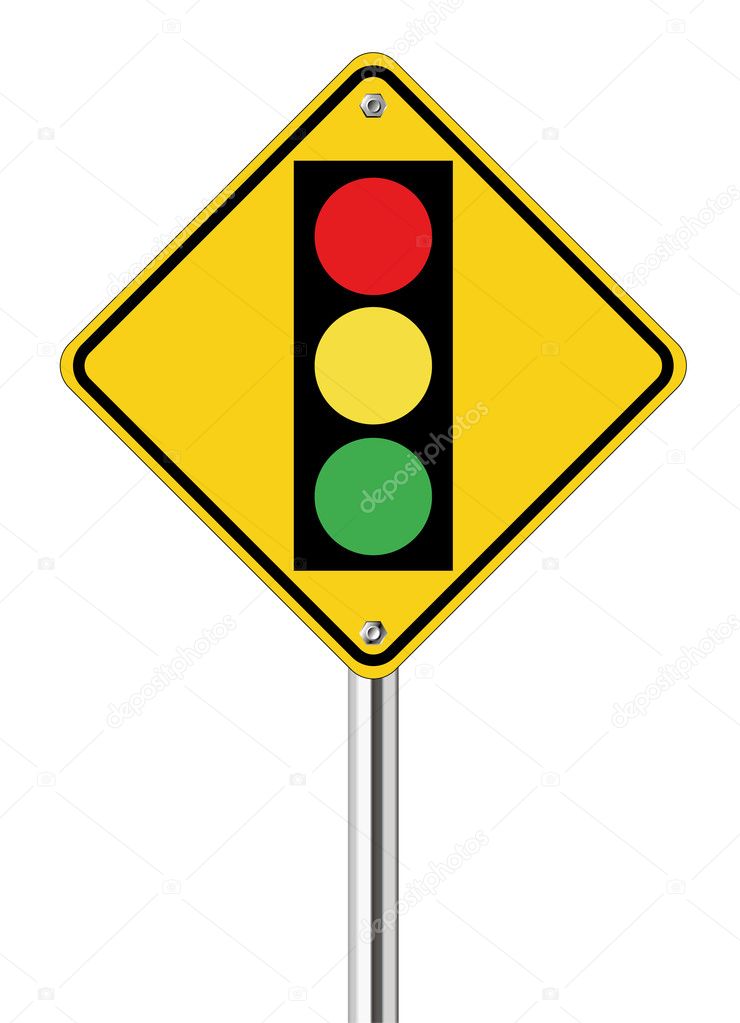 traffic light over yellow sign