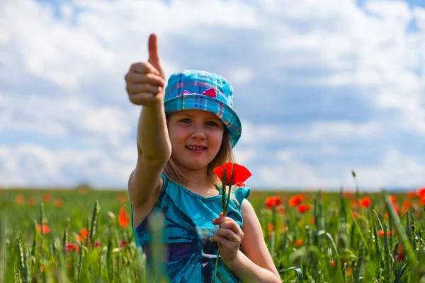 Young blond girl with red flowers — Stock Photo, Image