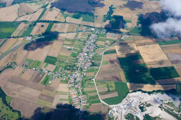 Stock image Aerial view of village landscape over clouds