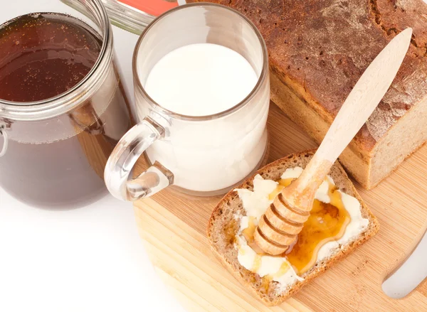 stock image Honey and dark bread