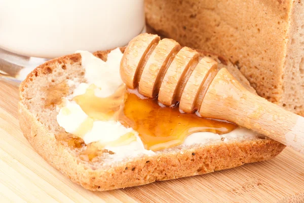 Stock image Honey and dark bread