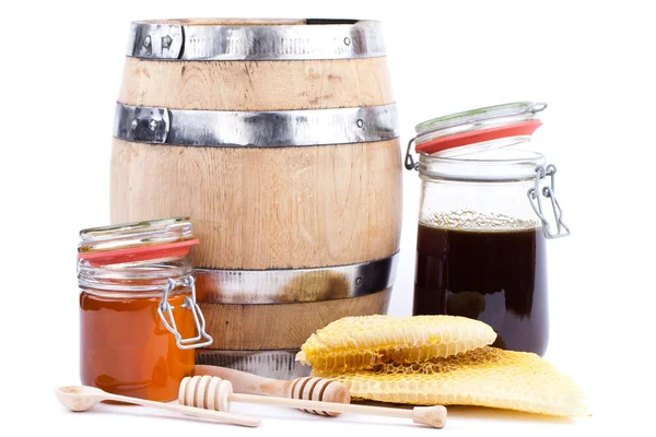 Honey jar and barrel — Stock Photo, Image