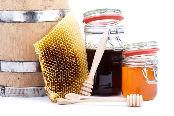 Frasco de mel e barril — Fotografia de Stock