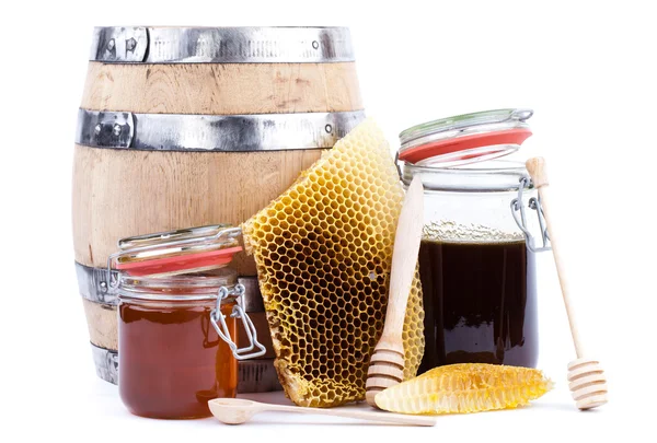 Honey jar and barrel — Stock Photo, Image