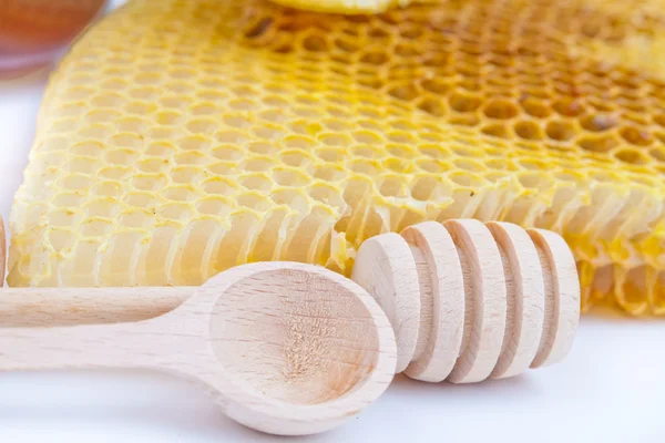 Honey comb and stick — Stock Photo, Image
