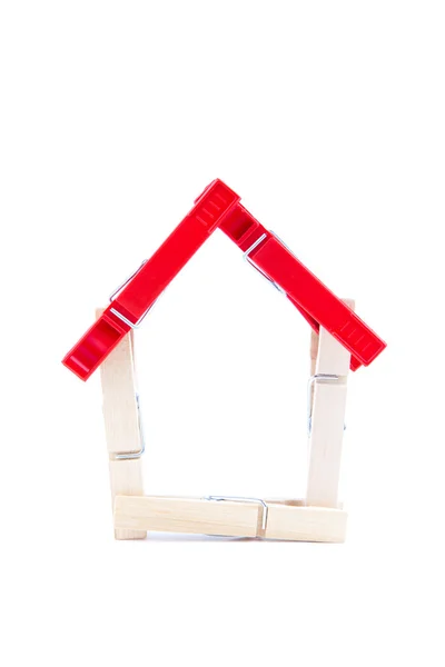 Clothes pins home symbol — Stock Photo, Image