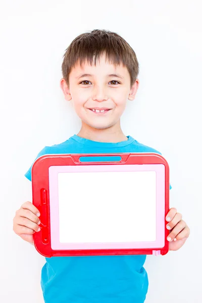 Smiling boy with a banner in his hands — Stock Photo, Image