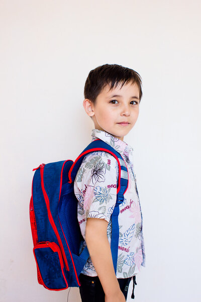 A boy with a backpack