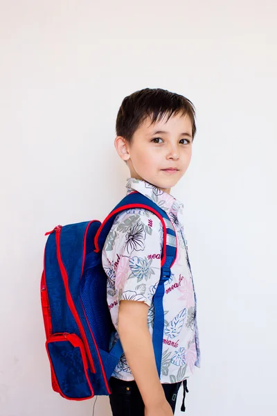 A boy with a backpack Stock Image