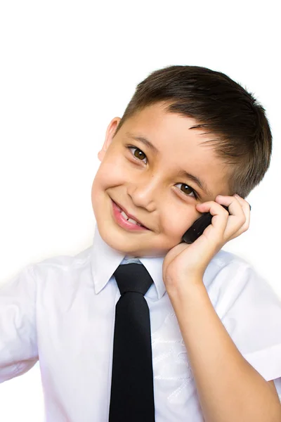 Mały chłopiec, rozmawia przez telefon — Zdjęcie stockowe
