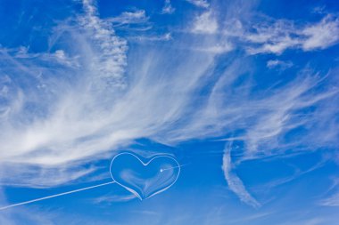 A symbol of pure love in the sky clipart