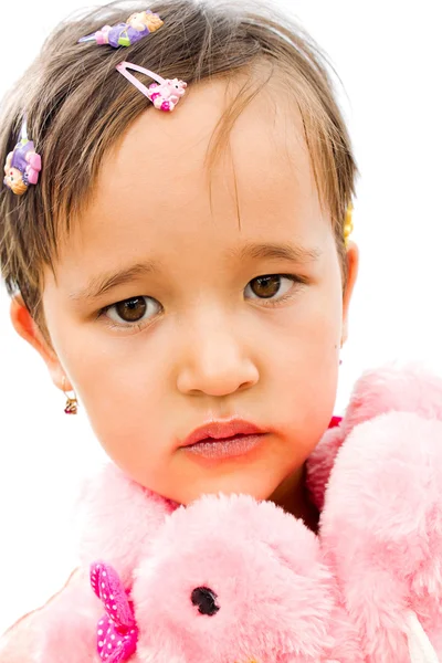 Porträt eines kleinen Mädchens in rosa — Stockfoto