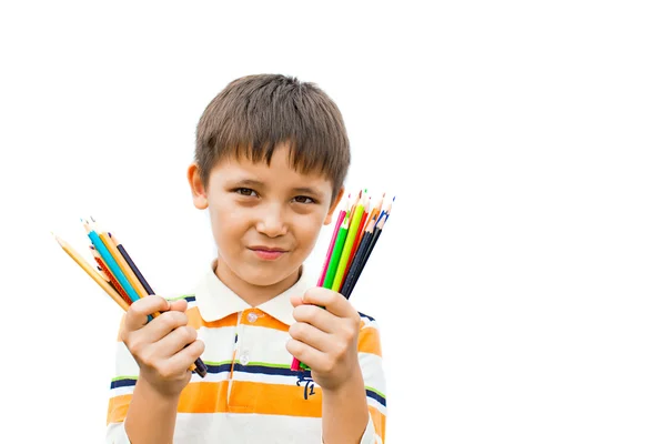 Menino com lápis coloridos em suas mãos — Fotografia de Stock