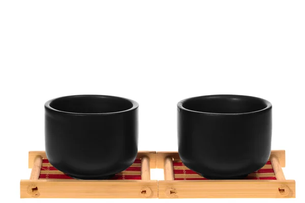 Black cups on a stand — Stock Photo, Image