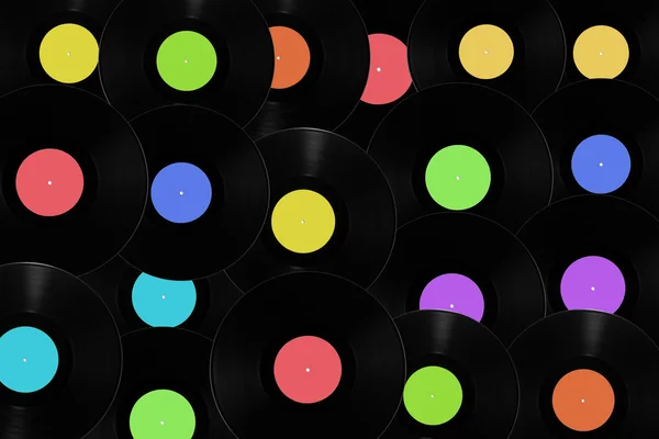 Vinylskivor med olika färgade etiketter. — Stockfoto