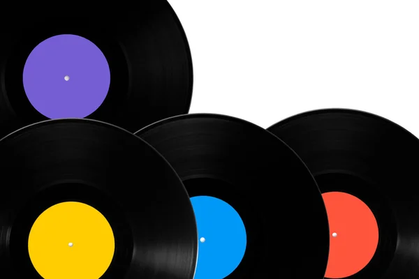 Vinylskivor med olika färgade etiketter. — Stockfoto