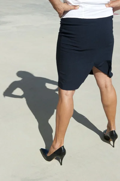 Sexy legs of confident woman as shadow — Stock Photo, Image
