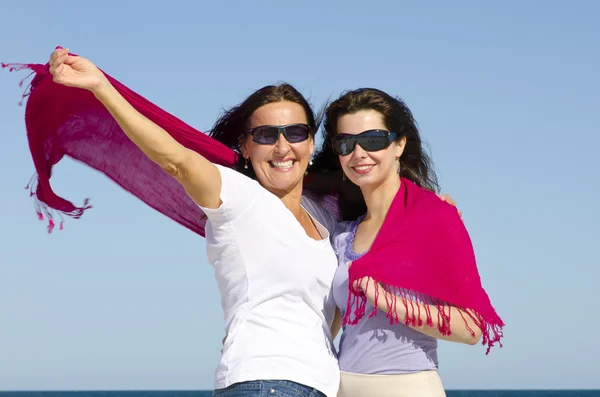 Family mother and daughter happy at ocean — Stock Photo, Image